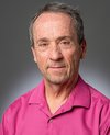 man in pink shirt