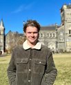 Man in front of building