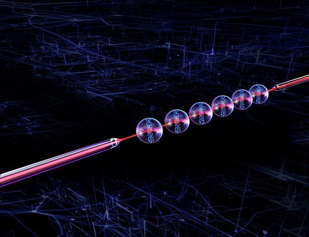 Illustration af en nanoskala optisk fiber, hvori fotoner er koblet til ensembler af mesoskopiske atomer, der hver især opfører sig som et kæmpe superatom.  Copyright Humboldt Universität zu Berlin.