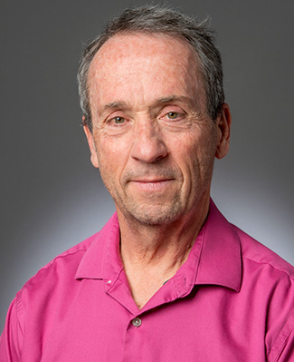 man in pink shirt
